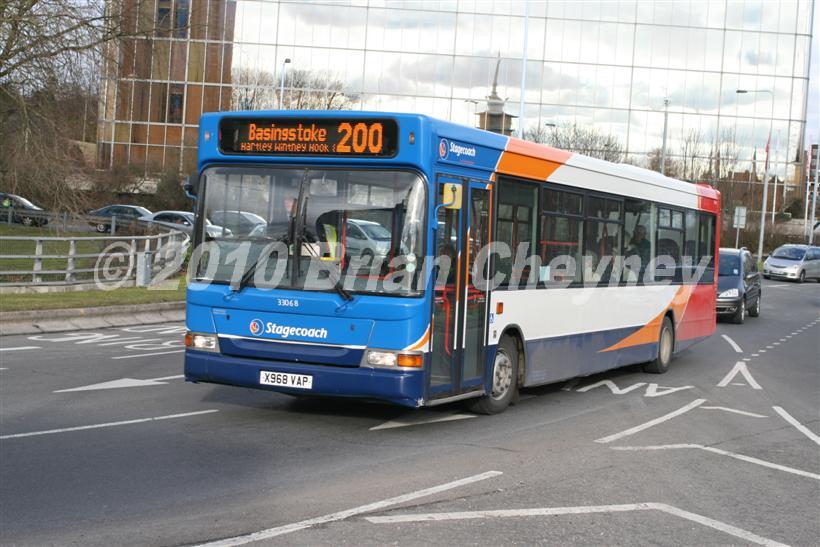 33068