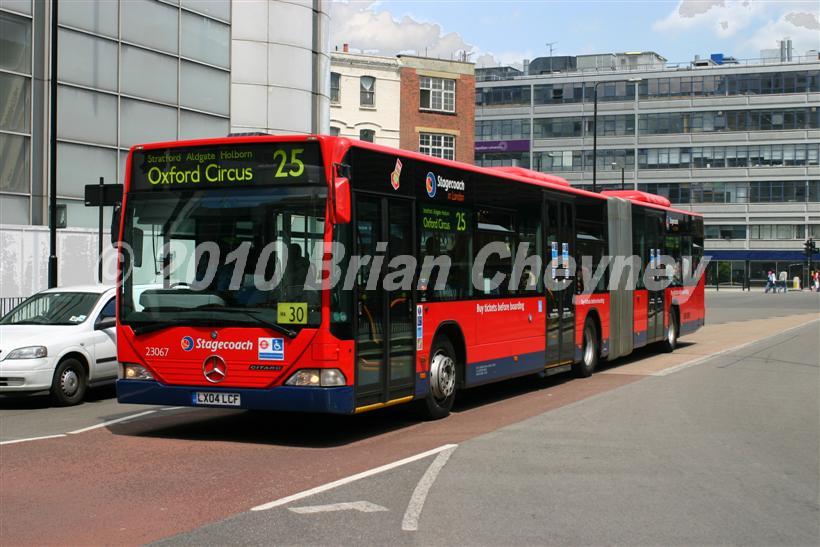 23067