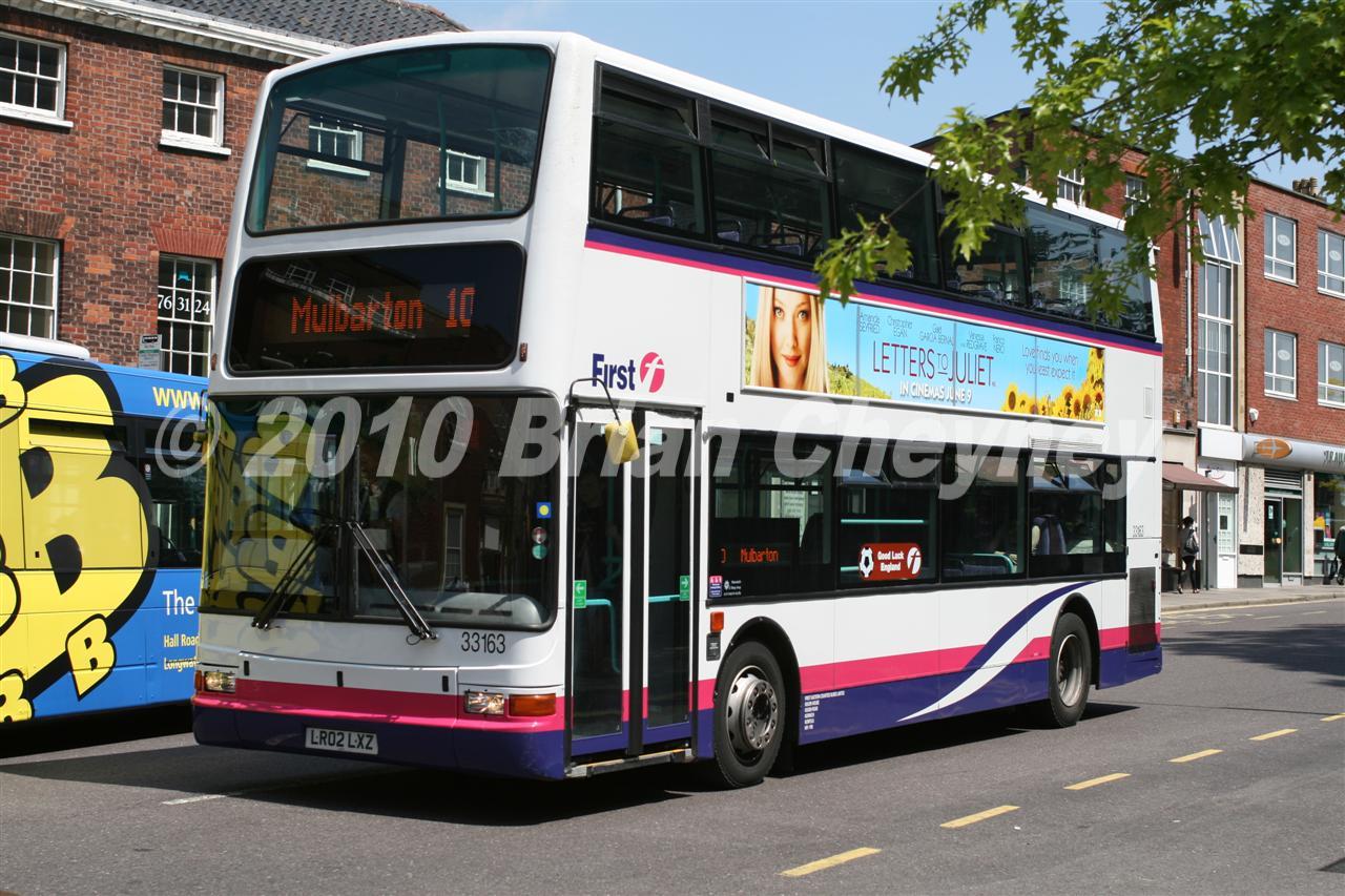 33163